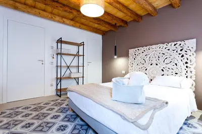 Letto o letti in una camera di B&B LA CANEVA 951