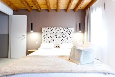 Letto o letti in una camera di B&B LA CANEVA 951