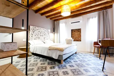 Letto o letti in una camera di B&B LA CANEVA 951