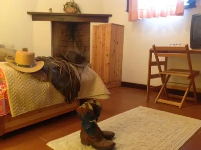 Letto o letti in una camera di Agriturismo Ai Gradoni