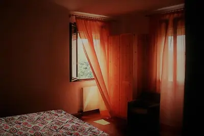 Letto o letti in una camera di Agriturismo Ai Gradoni