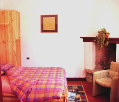 Letto o letti in una camera di Agriturismo Ai Gradoni