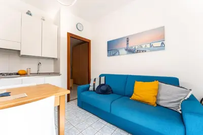 Cucina o angolo cottura di Bilocali Casa De Lazzari - Piazza Brescia - Adria Holiday Jesolo - FAMILY APARTMENTS