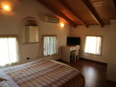 Letto o letti in una camera di B&B Primula House