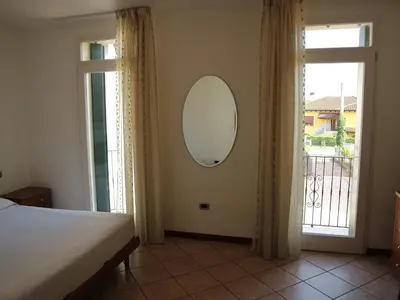 Letto o letti in una camera di B&B Primula House