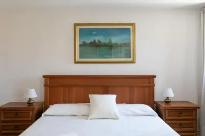 Letto o letti in una camera di Ca Santa Ternità