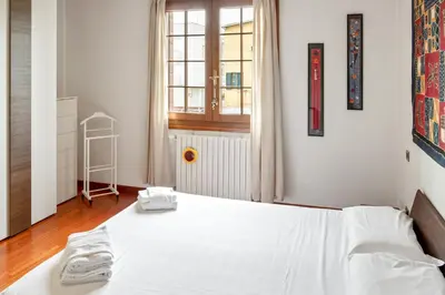 Letto o letti in una camera di GuestHost - Casa Nespolo Abano Terme