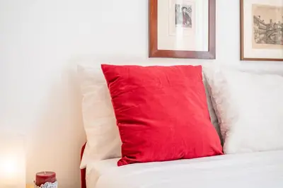 Letto o letti in una camera di GuestHost - Prato della Valle Red & Blu Studios