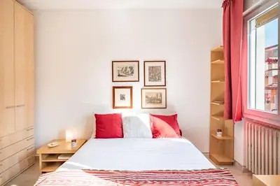 Letto o letti in una camera di GuestHost - Prato della Valle Red & Blu Studios
