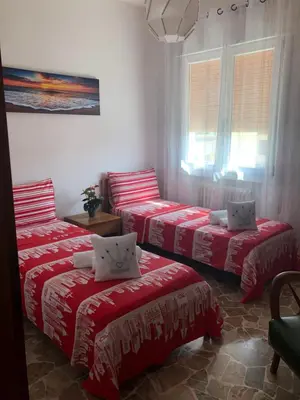 Letto o letti in una camera di Casa Lucia
