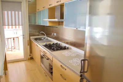 Cucina o angolo cottura di App4rent Augustus Sea View - Family House - wifi&parking - 3 rooms
