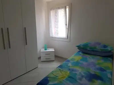 Letto o letti in una camera di ANGOLO DI LUCE