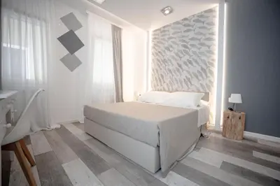 Letto o letti in una camera di Residenza Ca’ Vittoria