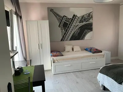 Letto o letti in una camera di Al 97 Locazione turistica