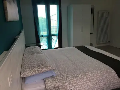 Letto o letti in una camera di Al 97 Locazione turistica