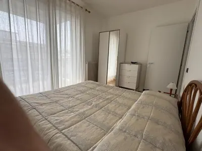 Letto o letti in una camera di Marconi Deluxe - Attico a Due Passi dal Mare