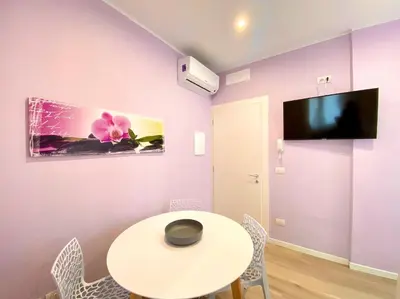 TV o dispositivi per l'intrattenimento presso Appartamenti Palladio - Carraro Immobiliare - Family Apartments