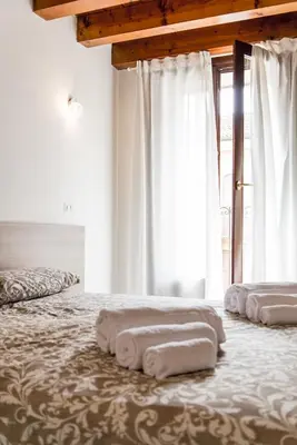 Letto o letti in una camera di INTERO APPARTAMENTO nel cuore di VICENZA