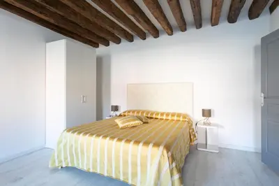 Letto o letti in una camera di Canaletto Apartment Rialto