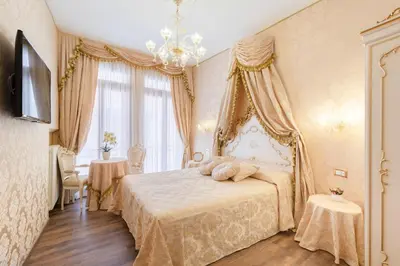 Letto o letti in una camera di Canal View San Marco Luxury Rooms