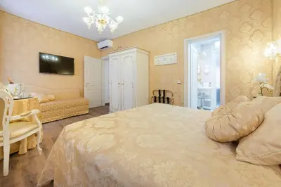 Letto o letti in una camera di Canal View San Marco Luxury Rooms