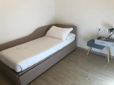 Letto o letti in una camera di Sole&Luna - Rooms