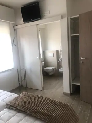Letto o letti in una camera di Sole&Luna - Rooms