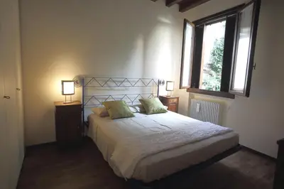 Letto o letti in una camera di DIMORA CECILIA, nel cuore della città
