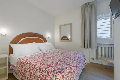 Letto o letti in una camera di Palazzo Brando - Living Apartments