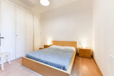Letto o letti in una camera di La Bauta