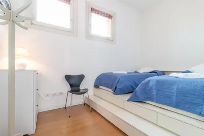 Letto o letti in una camera di Carmini Canal View & Lift by LionHost