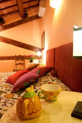 Letto o letti in una camera di Agriturismo Corte Carezzabella
