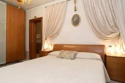 Letto o letti in una camera di CasaMariamaddalena