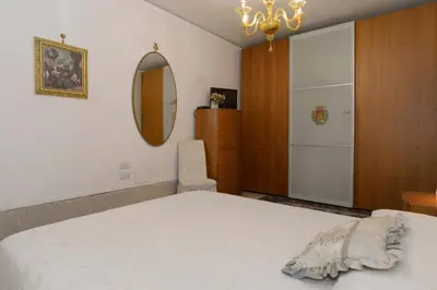 Letto o letti in una camera di CasaMariamaddalena