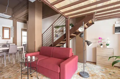 Area soggiorno di Madonna Granda Loft by Welc(H)ome