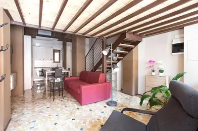 Area soggiorno di Madonna Granda Loft by Welc(H)ome
