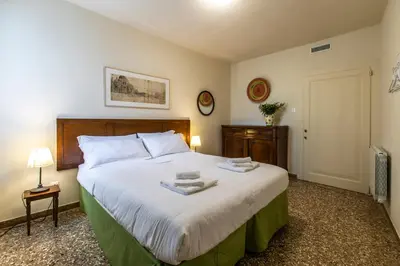 Letto o letti in una camera di Riva De Biasio Charming Apartment