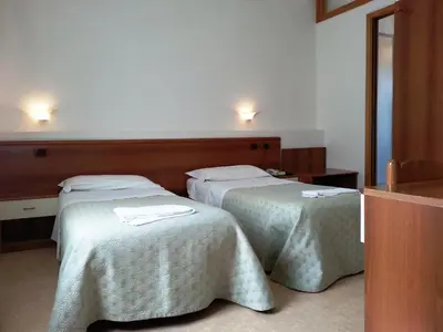 Letto o letti in una camera di Hotel Clodia