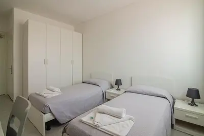 Letto o letti in una camera di Casa Lucia Valentini Terrani