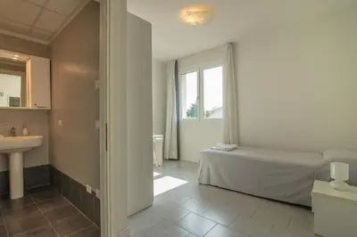Letto o letti in una camera di Casa Lucia Valentini Terrani