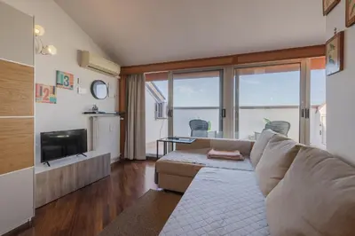 TV o dispositivi per l'intrattenimento presso Rooftop apartment Mestre