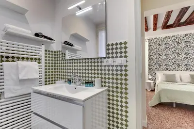 Letto o letti in una camera di Rugabella Rialto Deluxe by Wonderful Italy