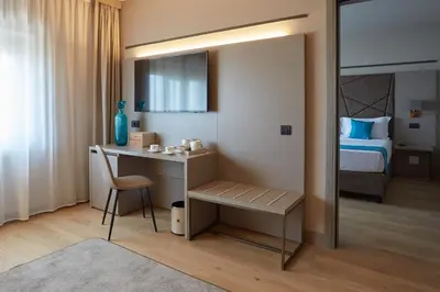 Letto o letti in una camera di DC HOTEL INTERNATIONAL