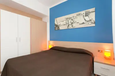 Letto o letti in una camera di Villa Valentina