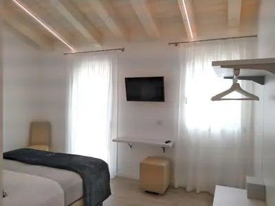 Letto o letti in una camera di Le Mandragole B&B