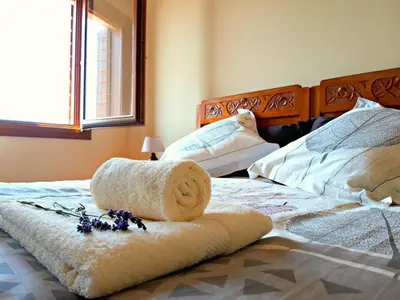Letto o letti in una camera di Le Vigne di Annalisa Sweet Relax Rooms in Unesco Prosecco D.o.c.g.