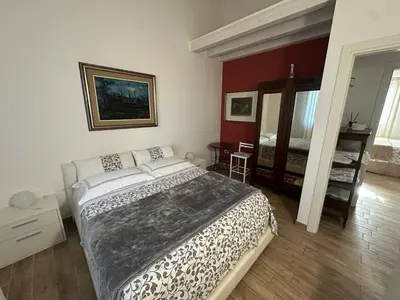 Letto o letti in una camera di Relax garden villa 1ora da venezia