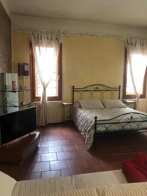 Letto o letti in una camera di La Suite del Doge - Parking