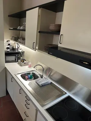 Cucina o angolo cottura di La Suite del Doge - Parking
