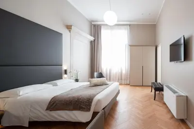 Letto o letti in una camera di Hotel Palazzo Martinelli Dolfin